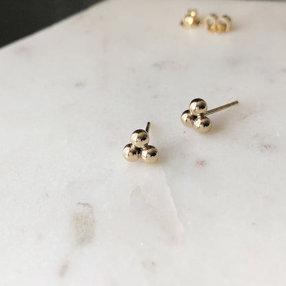 strut jewelry Triple Orb Stud Earrings